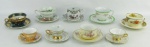 A. Nove xícaras em porcelana de diversas procedências e decorações.  Uma com pequena perda no esmalte.