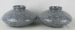 Par de vasos em cerâmica italiana, na cor cinza com salpicados na cor leitosa. Med. 13x23cm.