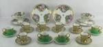 a) Dez xícaras para café em porcelana, sendo 4 no tom verde com detalhes em dourado da manufatura Steatita e 6 da manufatura Mauá, decoradas com rica pintura dourada em relevo. Alts. 5cm. b) Par de xícaras para chá com pratinhos para sobremesa em porcelana, com marca da manufatura na base, decorados com flores e folhas em policromia e detalhes em dourado. Alt. xícaras 7,5cm.