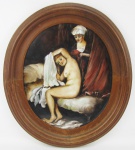 Placa oval em porcelana, com pintura policromada de "Mulher nua com ama ao lado". Emoldurada. Med. da placa 27x22,5cm.