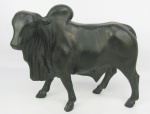 Escultura em estanho patinado representando "touro". Pequenos desgastes na patina. Med. 23x27,5x12cm.