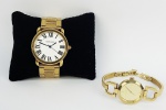 Dois relógios femininos de pulso com caixa e pulseira em metal dourado, sendo um da manufatura Monte Carlo, referencia 0670/054403, e DKNY modelo NY8870. Necessitam troca das baterias. Sem garantia de funcionamento.