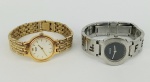 Dois relógios femininos de pulso, sendo um da manufatura Fendi, com caixa e pulseira em metal prateado, modelo 3050L 055-749, e Seiko, com caixa e pulseira em metal dourado, modelo 360608. Necessitam troca das baterias. Sem garantia de funcionamento.