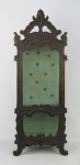 Oratório de mesa, estilo D. José, em madeira entalhada. Interior com pintura. Porta com vidro. Med. 67x25,5x13,5cm.