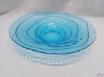 Fruteira, centro de mesa em vidro azul moldado. Medindo: 35 cm de diâmetro x 5,5 cm de altura.