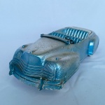 Brinquedo antigo TROL - Carro antigo conversível fabricado em plástico duro. Falta parabrisa e acabamento do conversível. As rodas giram livremente. Mede 22cm de comprimento. 