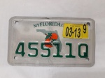 Linda placa americana de moto do estado da Florida, medindo 10 x 18 cm