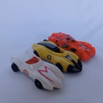 Lote com 3 carros do Speed Racer - Modelos Mach 5 / Shooting Star e não saberemos informar o vermelho. Promocional da afamada Nestle. As rodas giram livremente, e medem aproximadamente 7,5cm de comprimento
