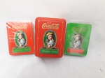 Par de baralhos Coca Cola lacrados,  1980,  acondicionado em lata de metal , medindo 10,3 x 7,5 x 4 cm
