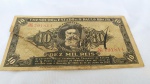 MILITARIA (R012) - RARA CÉDULA de 10 mil réis emitida pelo Governo Revolucionário de São Paulo,  durante a Revolução Constitucionalista de 1932 (Bônus do Thesouro do Estado Pró Constituição de São Paulo), com a imagem do Bandeirante Domingos Jorge Velho. Apresenta parte rasgada e colada com antiga fita adesiva. 
