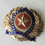 MILITARIA - Antiga insígnia de oficial da Polícia Militar de São Paulo. 