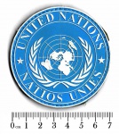 Militaria - Emblema emborrachado da ONU, material oficial da instituição. Em excelente estado de conservação, com velcro na parte traseira. O emblema mede 7,2 cm de diâmetro.