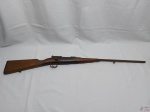 Rifle decorativo com coronha em madeira e maquinário em ferro, peça antiga e decorativa. Medindo 110cm de comprimento x 10mm de diâmetro de projétil.