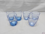 Lote composto de 3 copos em cristal italiano azul e 3 copos em cristal Bormili Rocco azul moldado. Medindo 7cm de diâmetro x 9,5cm de altura.