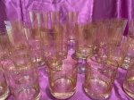Parte de serviço de copos, contendo 30 copos diversos, de cristal blumenau, na cor âmbar. Déc. de 60.