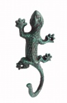 Exótico e diferente cabideiro de um gancho em ferro fundido na forma de lagarto.