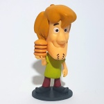 SCOOBY DOO - HANNA BARBERA - Figura em vinil do personagem Salsicha da série Scooby Doo, peça original Hanna Barbera. Medindo 7,5cm de altura.