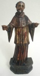 IMAGEM SACRA- Belíssimo imaginário representando SÃO RAIMUNDO NONATO, peça executada em madeira policromada e olhos de vidro, med. 27 centímetros.