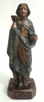 IMAGEM SACRA- Antigo imaginário representando SANTA LUZIA, peça executada em madeira policromada, med. 24 centímetros.