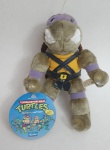 Antigo boneco de pelúcia tartaruga ninja Donatelo,  datado 1989, med.23 centímetros