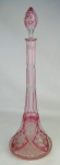 Baccarat - Belíssimo licoreiro de coleção cristal francês, na tonalidade doublet rosa. Ricamente lapidado em sulcos, estrelas, tijolinho e dedão. Alt. 46,5 cm.