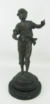 Escultura em bronze patinado representando "Menino segurando frutas". Base em mármore com dois estágios. Alt. total 28cm.
