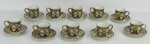 Dez xícaras para café em porcelana japonesa, com marca da manufatura Noritake, decoradas com pintura floral em policromia e ricos detalhes em dourado. Um pires com bicado e fio de cabelo. Minúsculos desgastes no dourado. Alt. xícara 5cm.