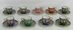 Nove xícaras de coleção em porcelana japonesa, de diversas cores, decoradas com figura feminina em policromia e ricos detalhes em dourado. Alt. xícara 5cm.