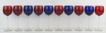 Dez taças em cristal, sendo 6 no tom vermelho e 4 azuis. Hastes e bases translúcidas. Alt. 18,5cm.