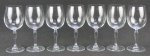 Sete taças para vinho branco em cristal translucido. Uma com pequena batidinha na borda. Alt. 17,5cm.