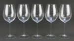 Cinco grandes taças em fino cristal translúcido, com marca da Cristallerie Strauss nas bases. Alt. 28,5cm.