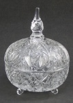Baleiro em cristal translúcido, com lapidações de rosetas, sulcos e minúsculos bico de jaca. Alt. 20,5cm.