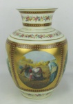Vaso anos 60, em porcelana policromada e decorada com cenas diversas em reserva. Pintura floral e rico dourado. Alt. 31,5 cm.