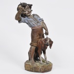 A. DE RUNERY - "Menino com o cão" Antiga Escultura francesa do Século XIX em bronze patinado, policromado e cinzelado. Peça assinada e apresentando selo da fundição Francesa. Não apresenta Base. Med: 42cm de altura