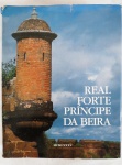 Livro "Real Forte Principe da Beira" - 375 páginas - Publicação bilíngue em inglês e português - Com dedicatória a Rudy - Capa dura com sobrecapa - 1985. Capa e contra capa com desgaste e manchas amarelas.