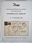 Catálogo de Selos da famosa Casa de Leilões " RAPP" intitulada Internationale Briefmarken Auktion in Kooperation mit Mohrmann Berlin -  15-17. November 1994-  Im Auktionsshaus Rapp In Wil - Schweiz, com  415 páginas. Com dedicatória para o Amigo Leone 20/02/95 do Amigo Salada.A casa de leilões Rapp é uma das maiores e mais vendidas casas de leilões no campo da filatelia há 50 anos.