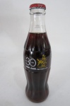 Rara garrafa de coleção , TAM 30 anos e Coca-Cola , edição limitada , em vidro 237 ml .