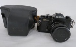 Câmera fotográfica RICOH 500 XR. A Ricoh 500 foi uma das primeiras câmeras rangefinder relativamente baratas de 35 mm a entrar no mercado norte-americano em 1957, sendo o modelo 500G produzido á partir de 1972. Peça de coleção, não foi testada.