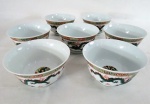 Sete (07) pequenos bowls de porcelana chinesa decorados com Dragões ao gosto oriental. Med. 7 x 12  cm cada.