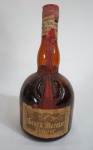 BEBIDAS - Uma (1)  garrafa  de Liqueur  Grand Marnier Orange e Fine Old Cognac Brandy, Paris France. conteúdo 700 ml, lacrada .