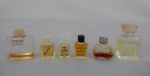 Seis ( 06) antigas miniaturas francesas de grandes marcas de perfumes, dentre eles: Ma Griffe, Cardin - Pierre Cardin, Yves Saint Laurent, Ivoire, Opium e outro.