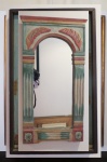 Belíssimo e antigo espelho no estilo rústico, com moldura em madeira de demolição, entalhado e frisado com pátina policromada. Med. 68 x 34 cm.