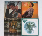 Quatro (04) LPs The Temptations, Johnny Mathis, Elvis e Bob Dylan. Capa com pequeno desgaste.