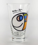Copo em vidro decorado coleção Romero Britto ano 2007, capacidade 300 ml Medida aproximada altura 14,5 cm