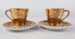 2 xícaras douradas para café em porcelana nacional. Medidas aproximadas pires diâmetro 10,5 cm e xícara altura 5,5 cm e diâmetro 5,5 cm