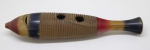 INSTRUMENTO MUSICAL - Peixe Guiro, instrumento de percussão tradicional da américa latina, não possui baqueta, pequeno trinado e marcas de uso. Med. 40 cm.