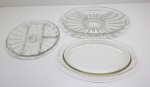 DEMI CRISTAL - Lote de 1 petisqueira oval e 1 bandeja redonda. Med. 35x26 cm e 26 cm.