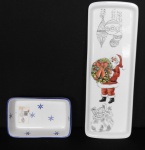 Duas bandejas de porcelana menor para petiscos com fundo branco decorada com estrelas azul medindo 18cm x 12cm x 4,5cm a maior para pão em porcelana branca com decorações natalina, medindo 38cm x 13cm x 2cm