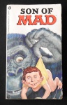 Livro de Bolso "MAD" déc. 70/80 texto em inglês, apresenta furos de insetos.