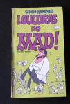 Livro de Bolso "MAD" déc. 70/80 texto em inglês, apresenta furos de insetos.